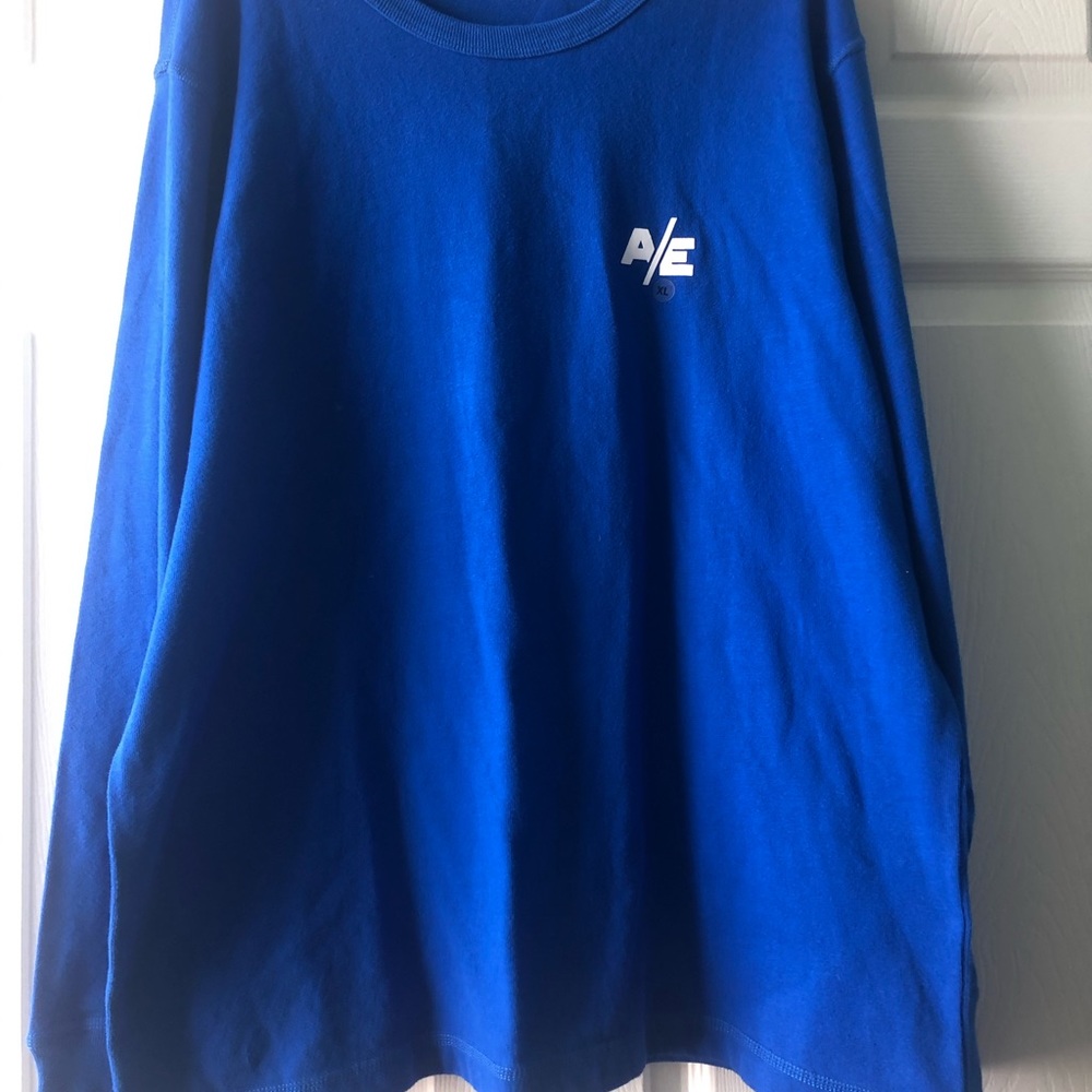 A long sleeve, dark blue shirt for men. Size - XL